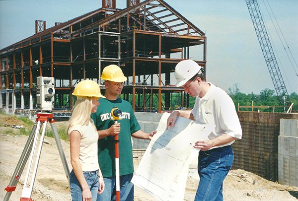 Group looking at construction plans