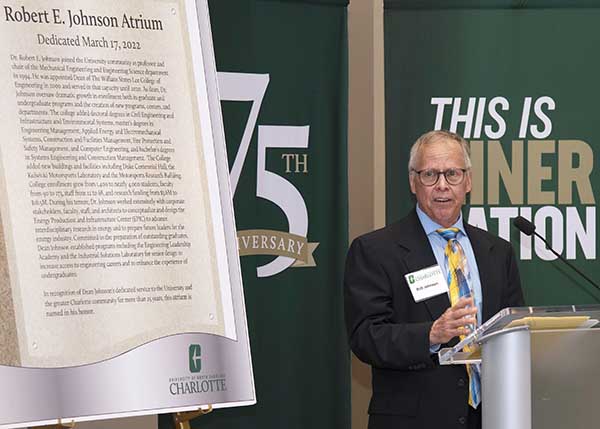 Dean Emeritus Bob Johnson speaks at podium