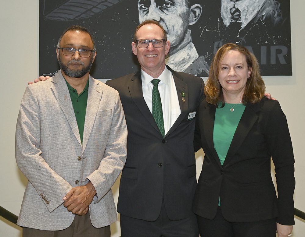 Caption: Charlotte AIR Institute Co-Directors Srinivas Pulugurtha and Tara Cavallline with Dean Rob Keynton