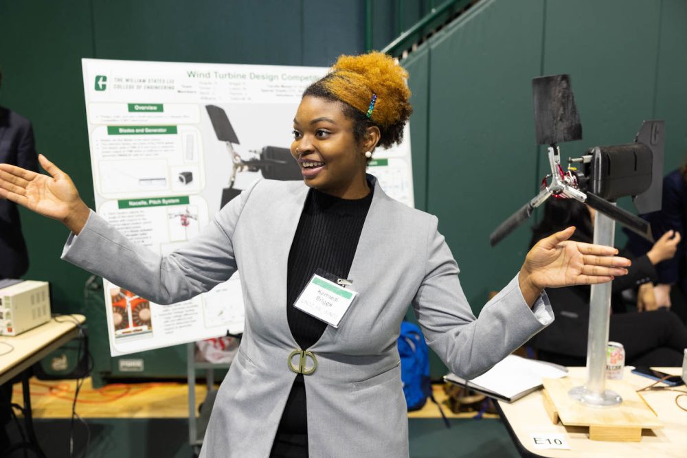 Engineering senior Kennedi Briggs presents at the Senior Design Expo