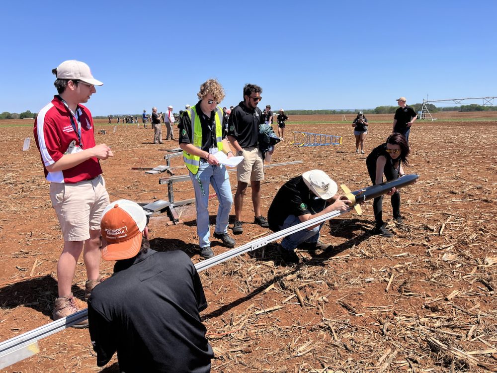 49er Rocketry team members prepare rocket for launch